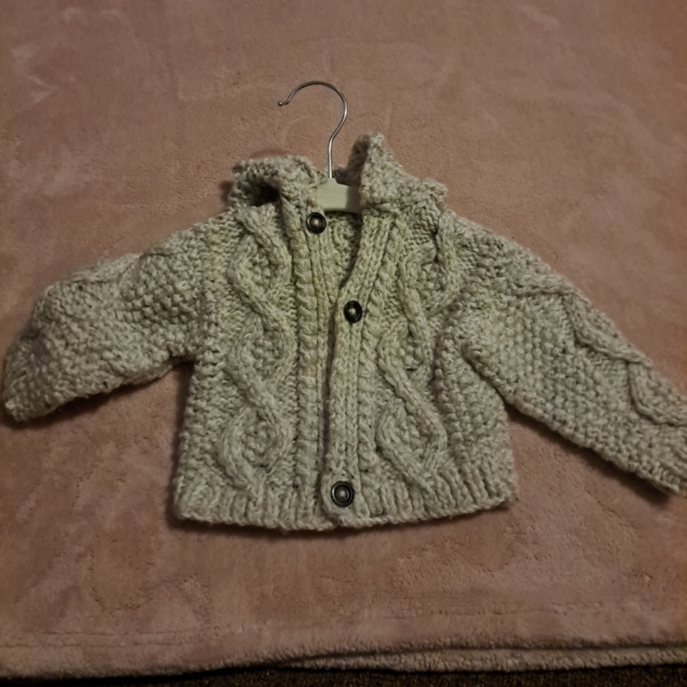 Cream Cable Knit Sweater with Intricate Patterns